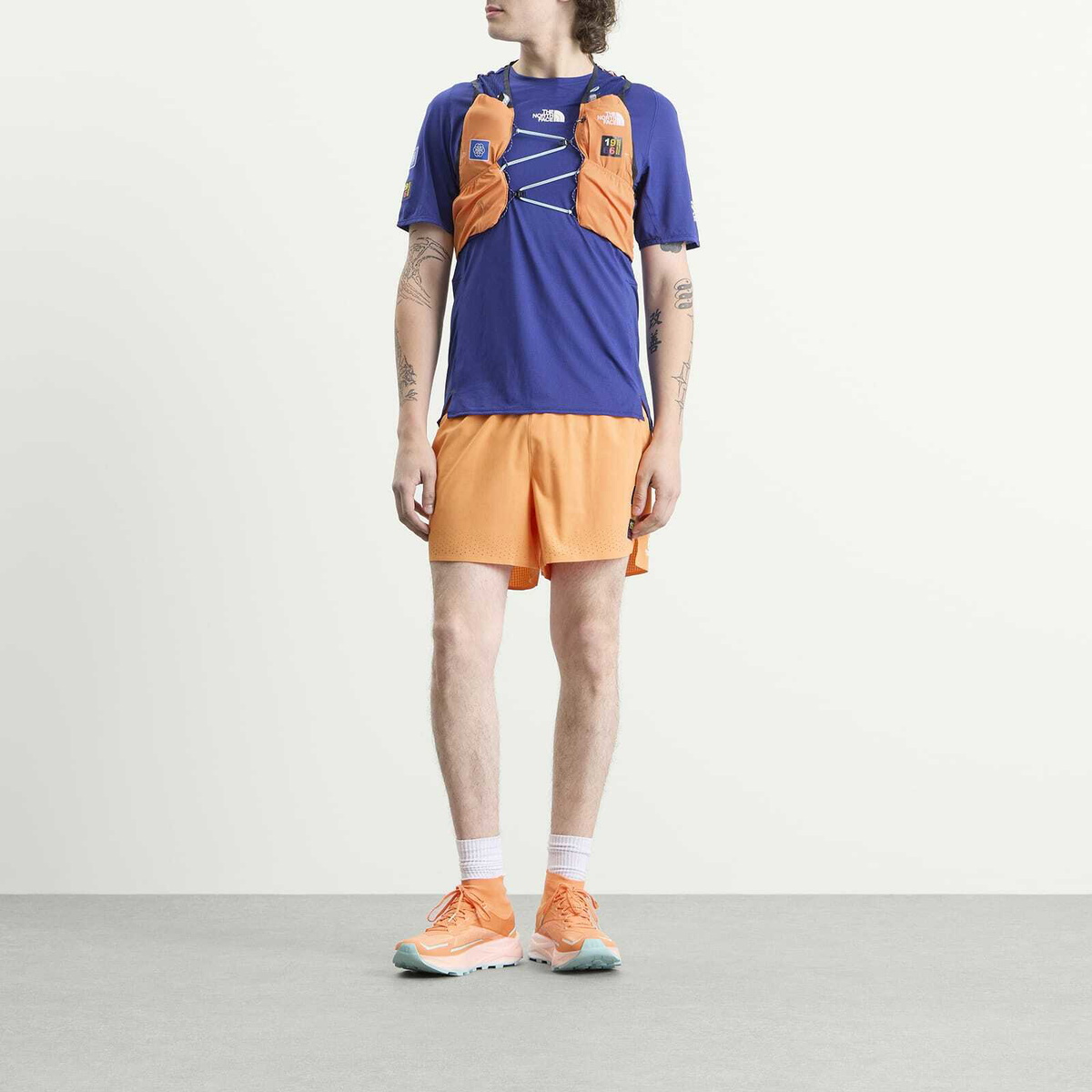 The North Face Men's Summit Run Expedition Vest 10 in Papaya/Bold Blue