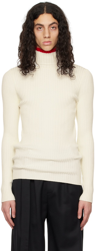 Photo: ANDREĀDAMO Off-White Striped Turtleneck