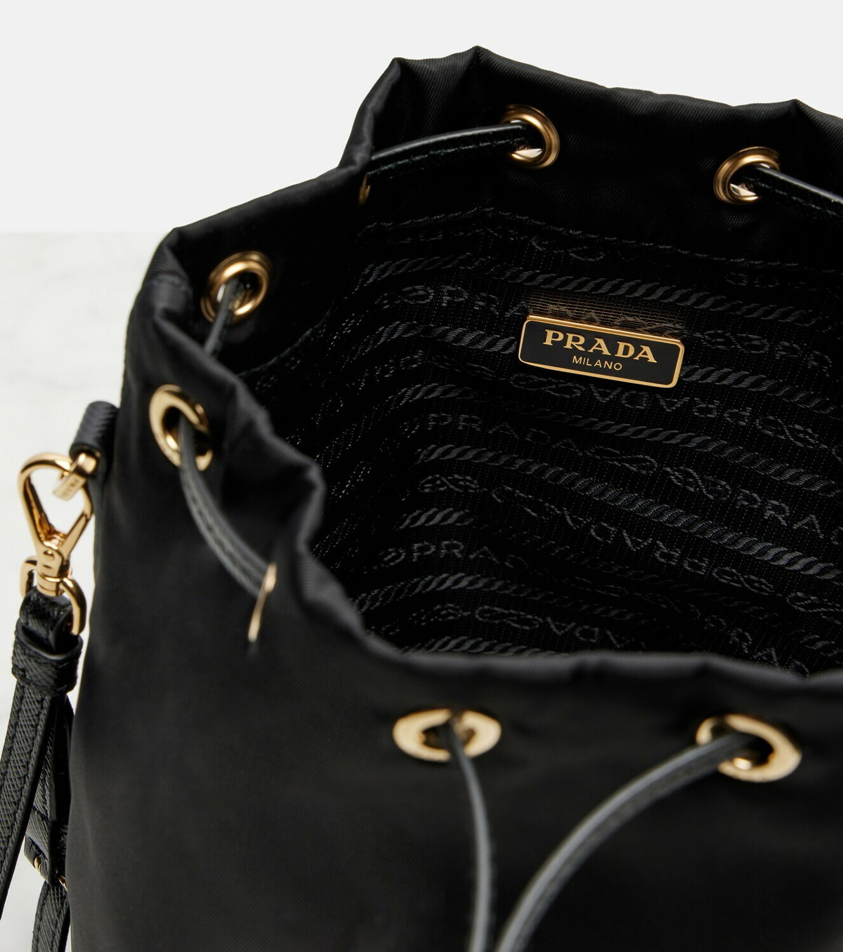 Prada Re-Nylon leather-trimmed bucket bag