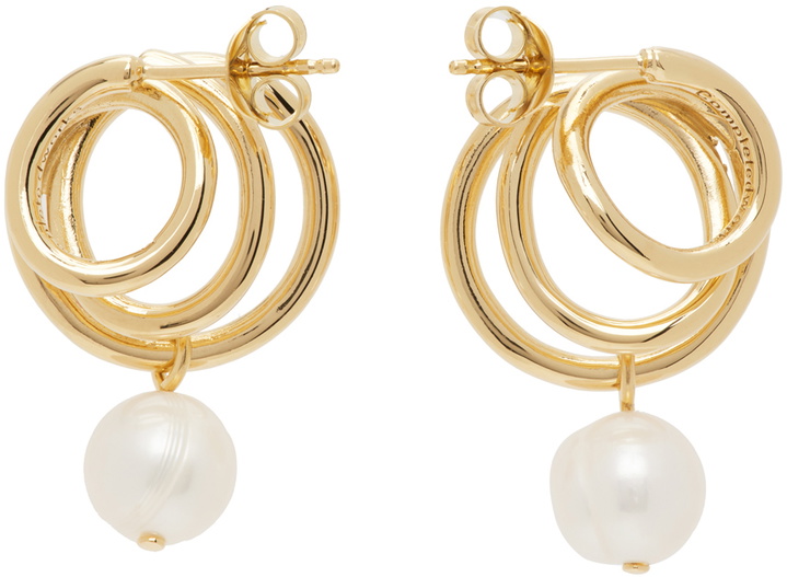 Photo: Completedworks Gold Coil Flow Earrings