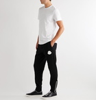 Moncler - Tapered Logo-Appliquéd Loopback Cotton-Jersey Sweatpants - Black