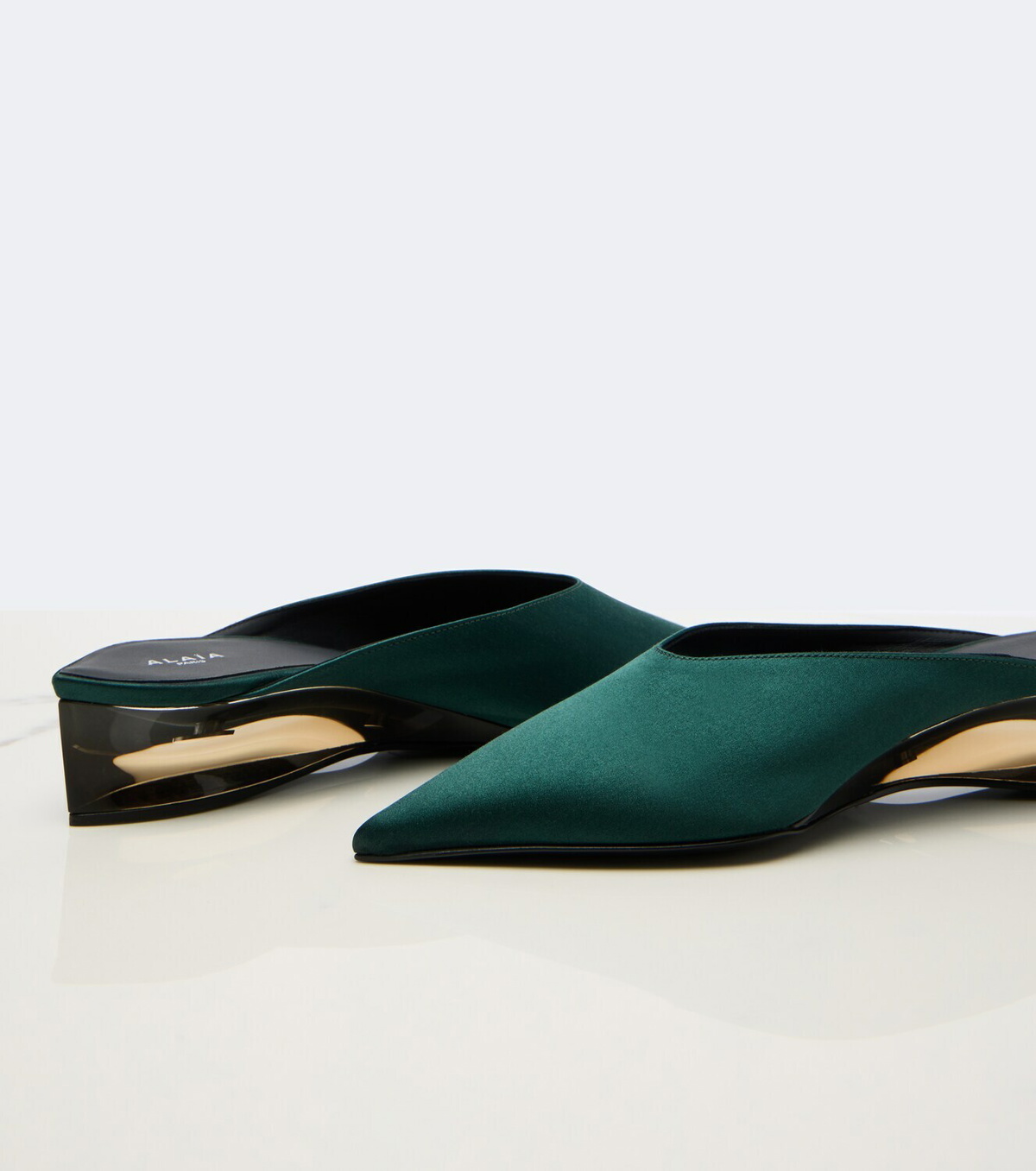 Alaïa Invisible satin wedge mules