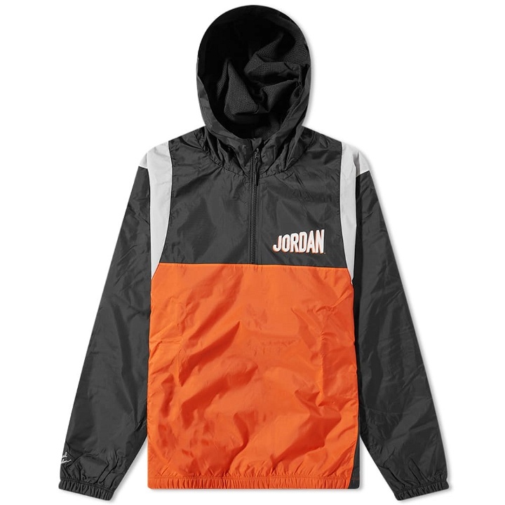 Photo: Nike Men's Air Jordan Flight Hooded Woven Jacket in Black/Rush Orange