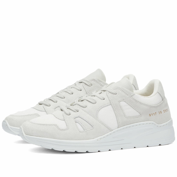 Photo: Woman by Common Projects Women's Cross Trainer Sneakers in White
