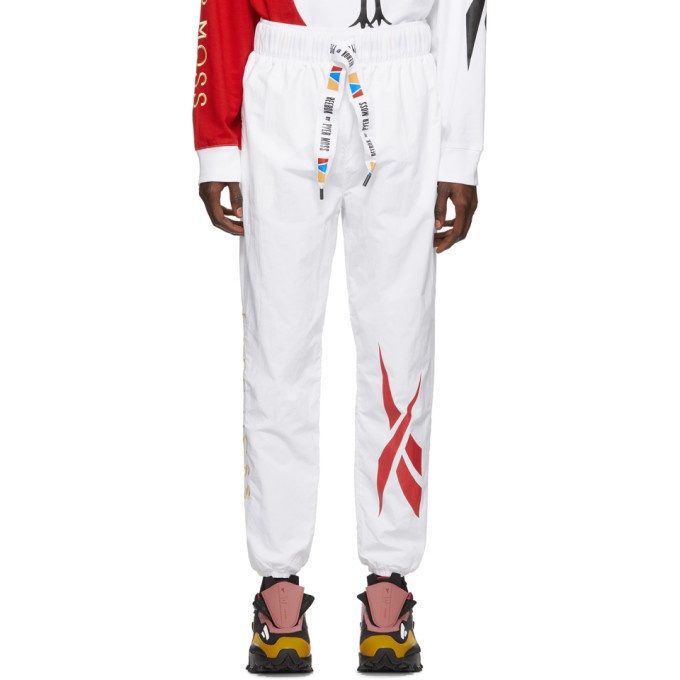 Photo: Reebok by Pyer Moss White Collection 3 Woven Franchise Track Pants