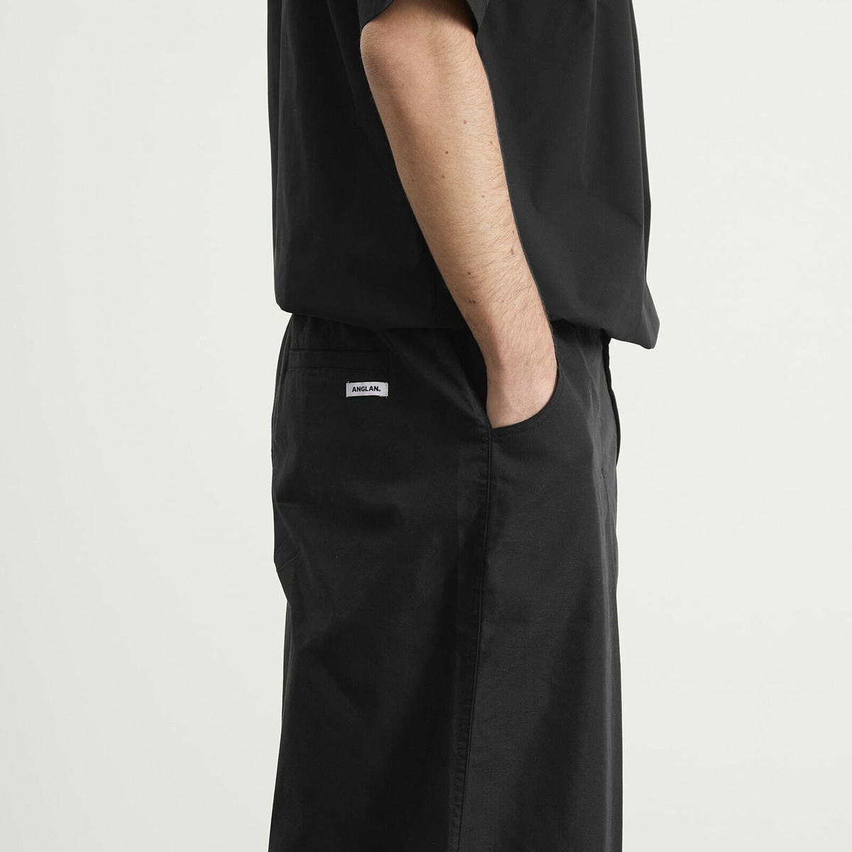 Anglan Men's Unbalance Long Tuck Balloon Pants in Black