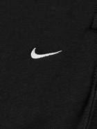 Nike - Solo Swoosh Tapered Logo-Embroidered Cotton-Blend Jersey Sweatpants - Black