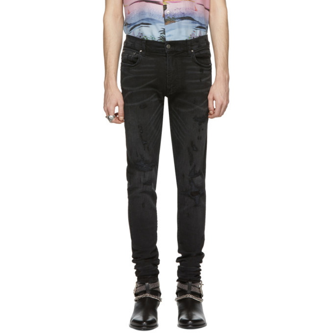 Photo: Amiri Black Bruise Repaired Jeans