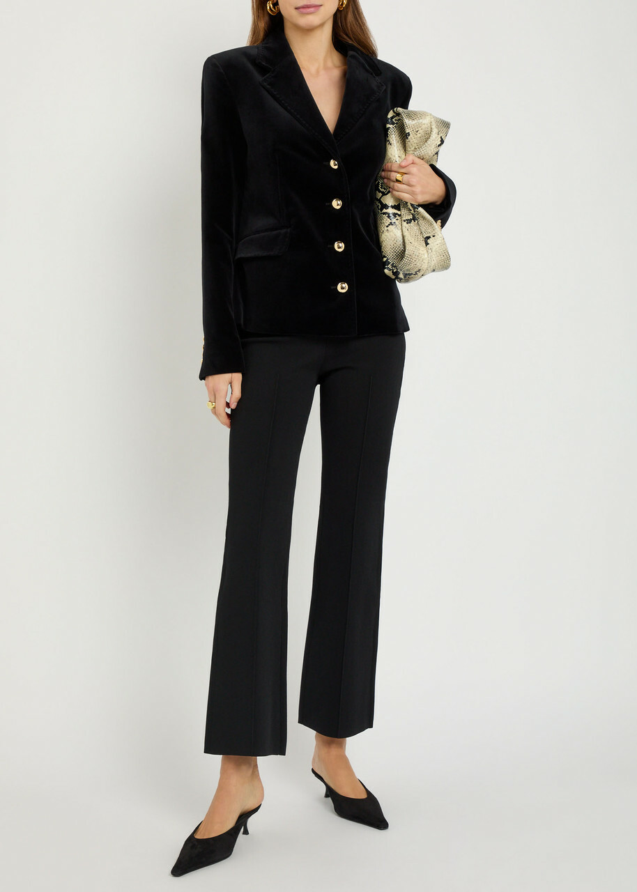 Simkhai Ashlon Flared-leg Stretch-knit Trousers Black