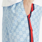 Gucci Men's GG Logo Swim Shorts in Azure