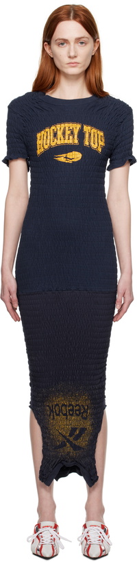 Photo: Conner Ives Navy Reconstituted Midi Dress