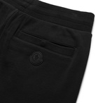 MONCLER - Tapered Logo-Print Loopback Cotton-Jersey Sweatpants - Black