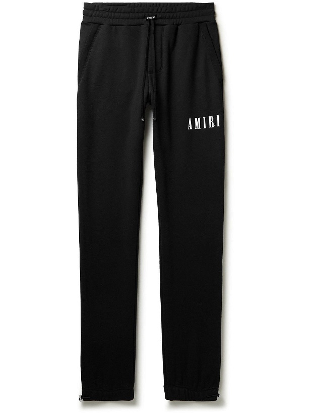Photo: AMIRI - Tapered Logo-Print Cotton-Jersey Sweatpants - Black