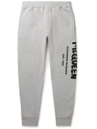 ALEXANDER MCQUEEN - Tapered Logo-Print Mélange Loopback Cotton-Jersey Sweatpants - Gray