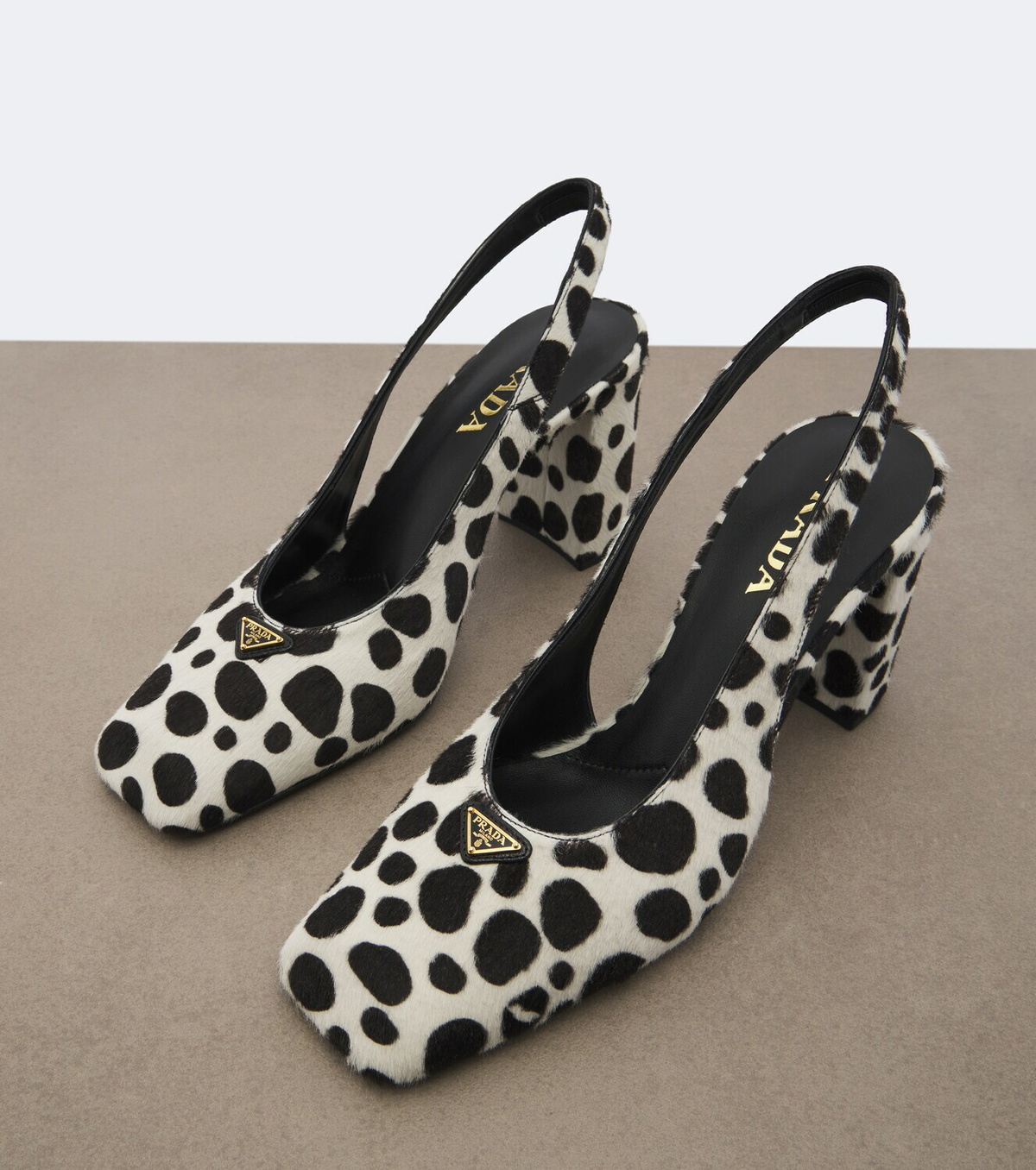 Prada Cow-print calf hair slingback pumps