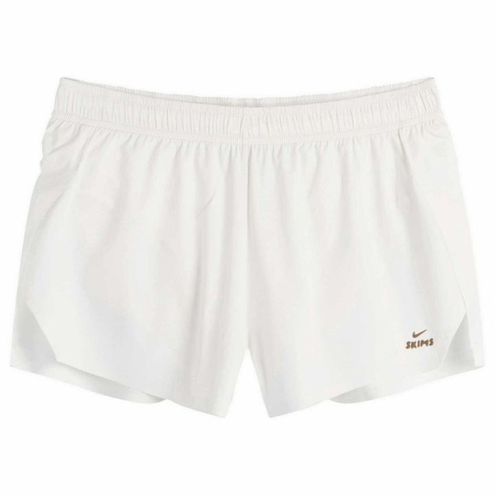 Photo: Nike Women's x SKIMS Stretch Nylon Runner Short in Ivory