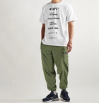 WTAPS - Tapered Logo-Appliquéd Nylon Track Pants - Green