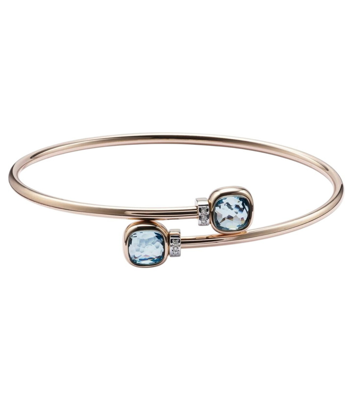 Photo: Pomellato Nudo 18kt white gold bangle with diamonds and topaz