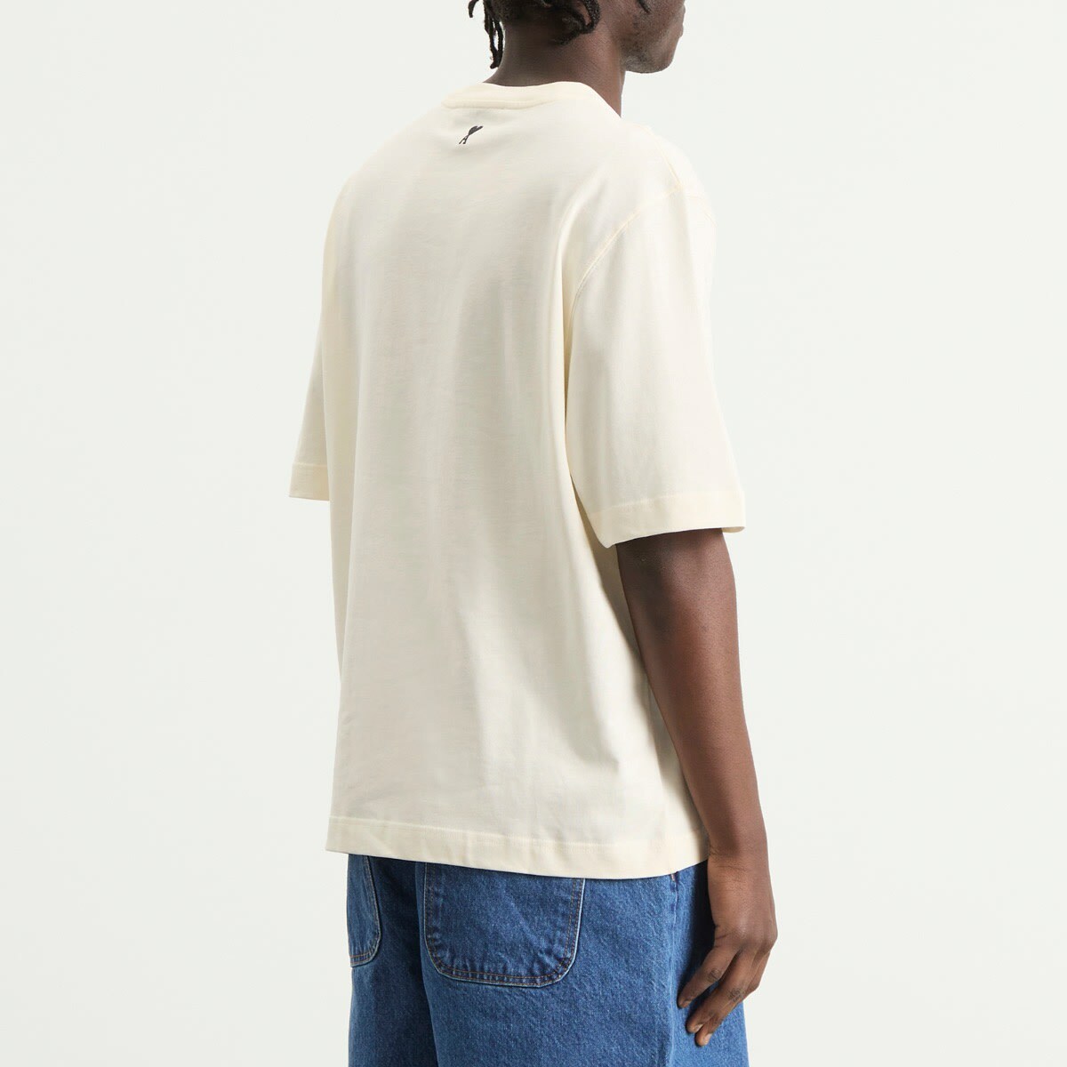 AMI Paris Men's Boxy Fit Short Sleeve T-Shirt in Blanc Creme AMI