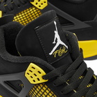 Air Jordan Men's 4 Retro Sneakers in Black/Tour Yellow