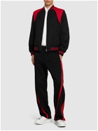ALEXANDER MCQUEEN Twisted Loopback Cotton Sweatpants