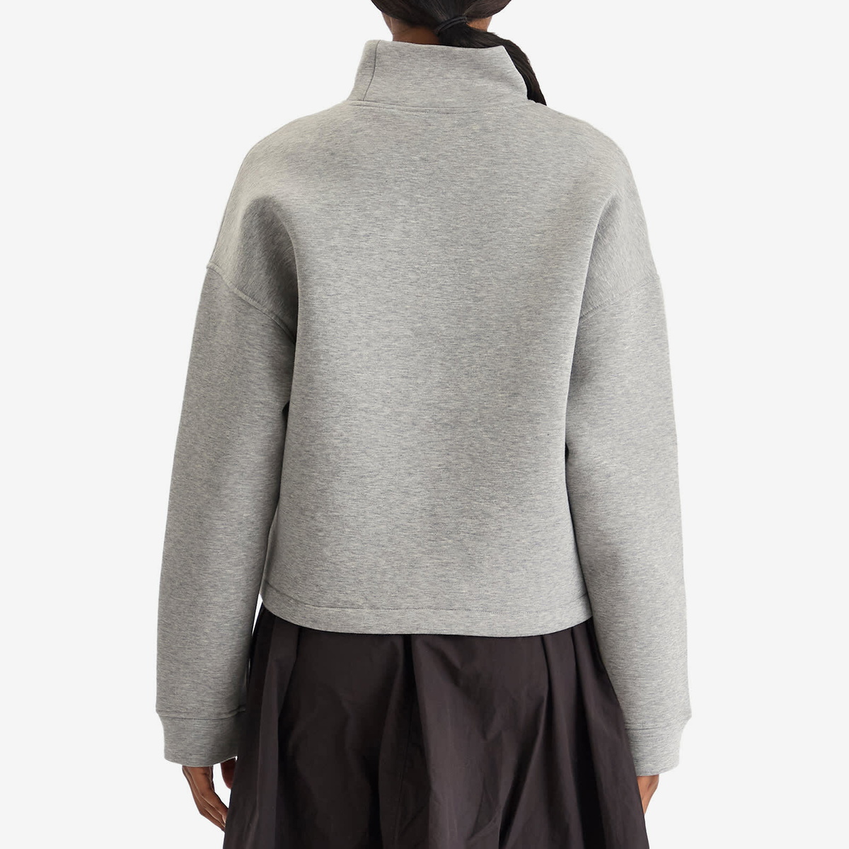 The North Face Women's Mock Neck Relaxed Sweatshirt in Metallic Silver Heather