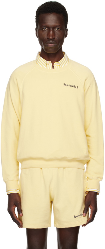 Photo: Sporty & Rich Yellow Serif Logo Sweatshirt