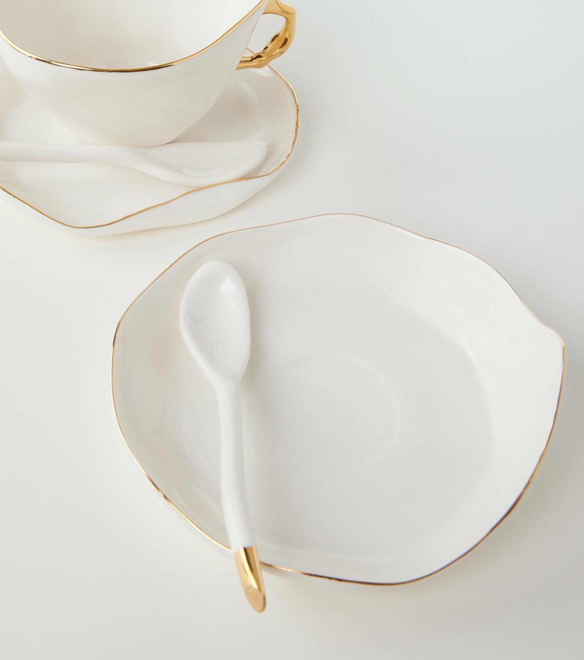 Seletti Meltdown set of 2 teacups, saucers, and spoons by JordanLuca