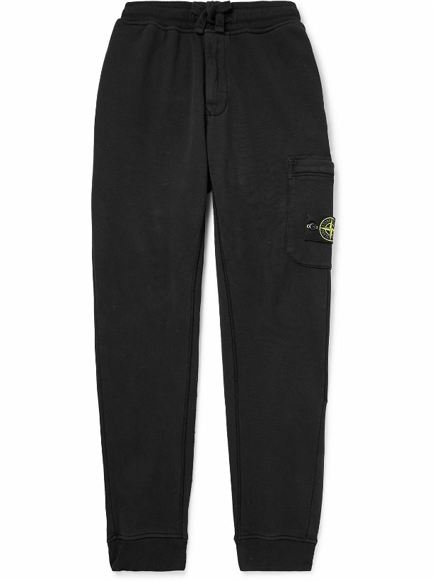 Photo: Stone Island - Tapered Logo-Appliquéd Cotton-Jersey Sweatpants - Black