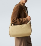 The Row Logan E/W leather-trimmed crossbody bag