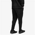 Homme Plissé Issey Miyake Men's Pleated Tapered Trousers in Black