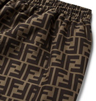 Fendi - Tapered Logo-Print Shell Drawstring Trousers - Brown