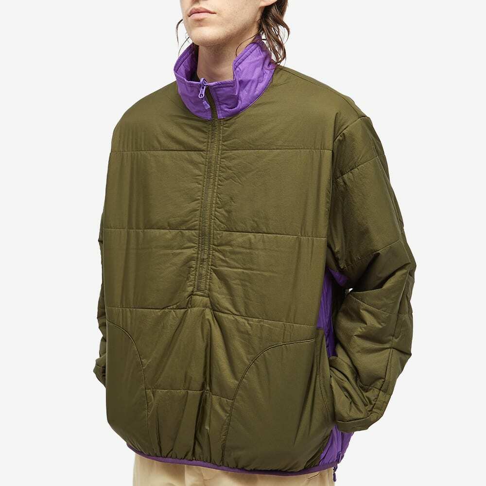 DAIWA Men's Tech Reversible Pullover Puff Jacket in Purple DAIWA