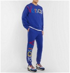 Versace - Tapered Logo-Embroidered Fleece-Back Cotton-Jersey Sweatpants - Blue