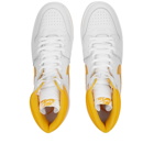 Air Jordan Nike Air Ship Sneakers in White/University Gold