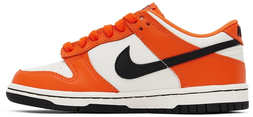 Orange store nikes kids