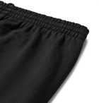 Balenciaga - Tapered Logo-Print Loopback Cotton-Jersey Sweatpants - Black