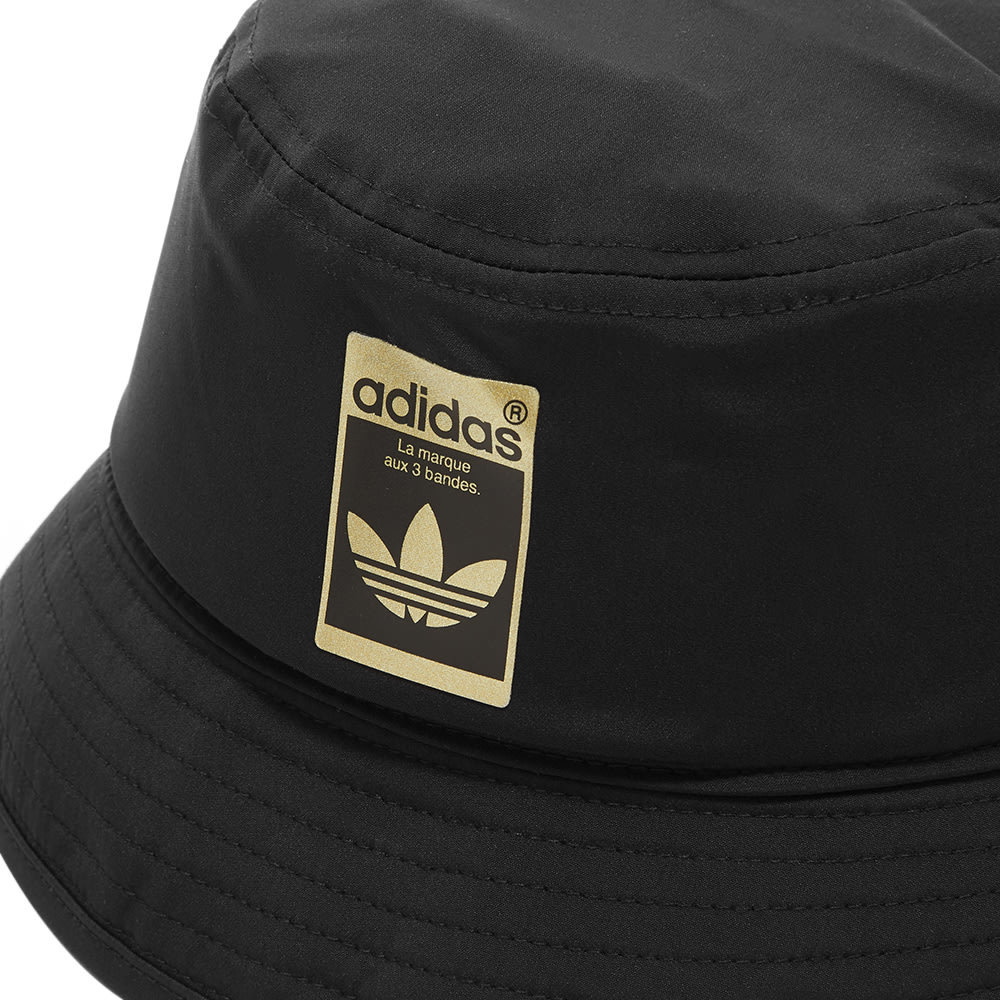 Adidas bucket hot sale hat gold