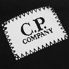 C.P. Company Undersixteen Men's Block Logo Tee in Black
