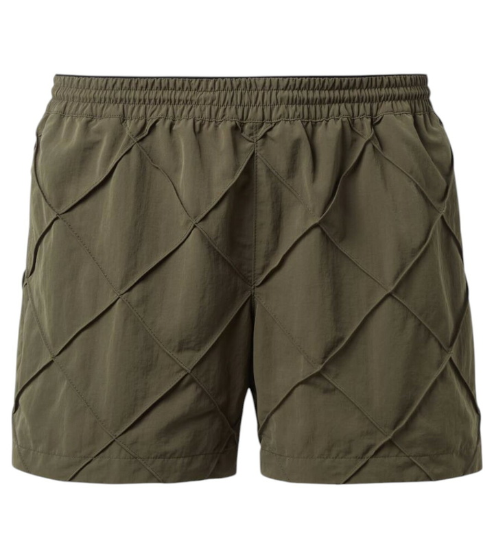 Photo: Bottega Veneta Intrecciato swim trunks