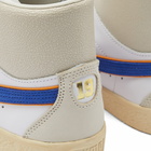 Puma x Rhuigi Clyde Mid BBall Sneakers in White/Royal Sapphire