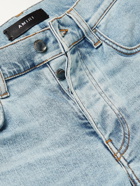 AMIRI - Playboy Skinny-Fit Distressed Printed Stretch-Denim Jeans - Blue