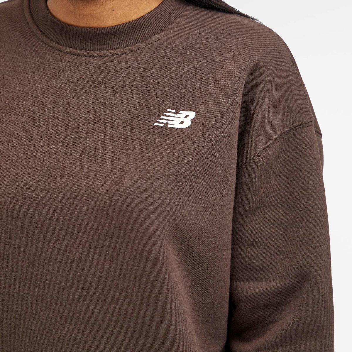 New Balance Women's Linear Heritage Brushed Back Fleece Crewneck in Black Coffee