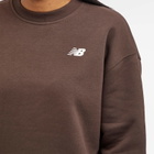 New Balance Women's Linear Heritage Brushed Back Fleece Crewneck in Black Coffee