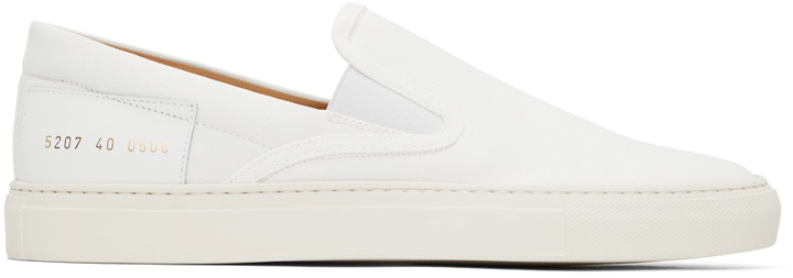 Photo: Common Projects White Canvas Slip-On Sneakers