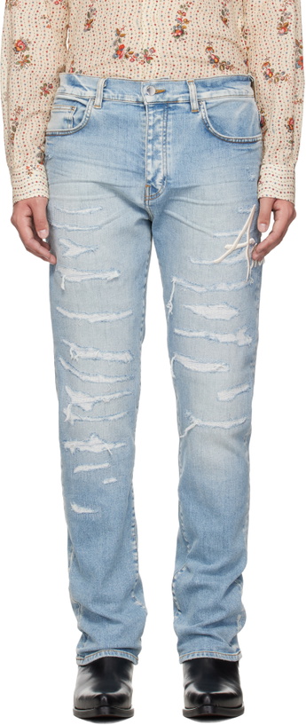 Photo: AMIRI Blue 'AMIRI' Repaired Slim Jeans