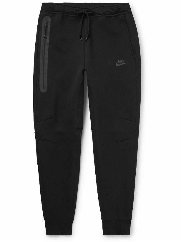 Photo: Nike - Tapered Logo-Print Cotton-Blend Tech Fleece Sweatpants - Black