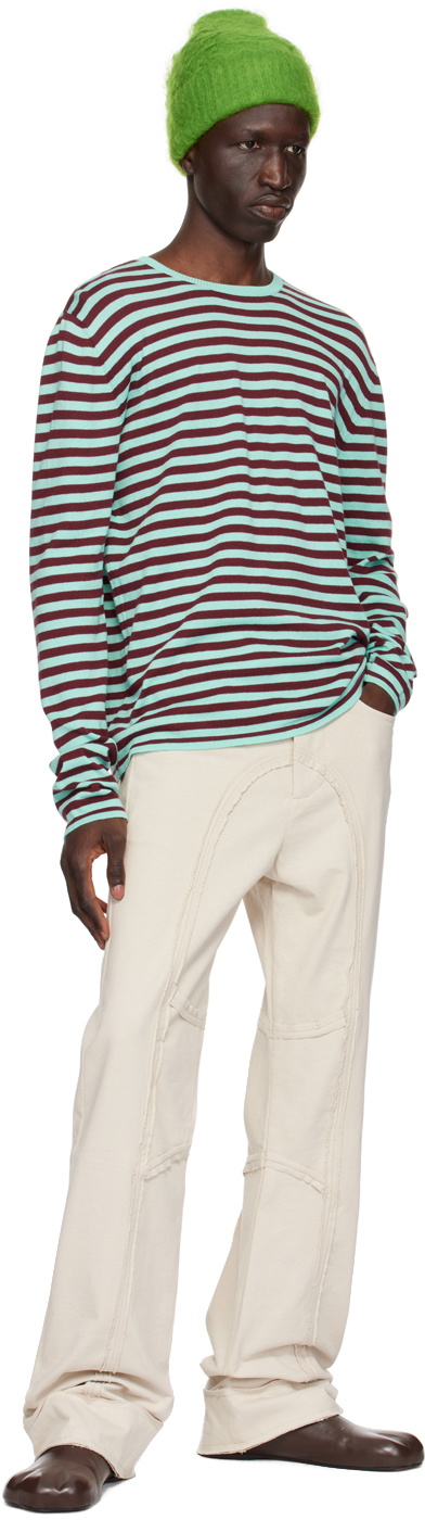 Edward Cuming Off-White Raw Edge Jeans