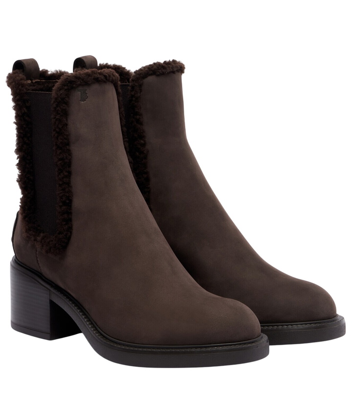 Photo: Tod's Shearling-lined leather Chelsea boots