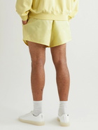 FEAR OF GOD ESSENTIALS - Wide-Leg Logo-Flocked Shell Drawstring Shorts - Yellow